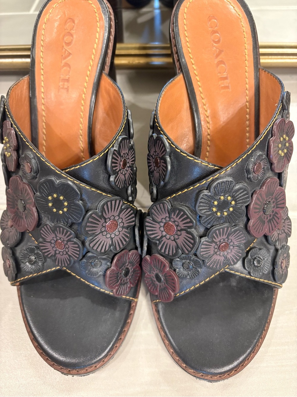 COACH Black Leather Floral Appliqué Slide Mules with Burgundy Accents